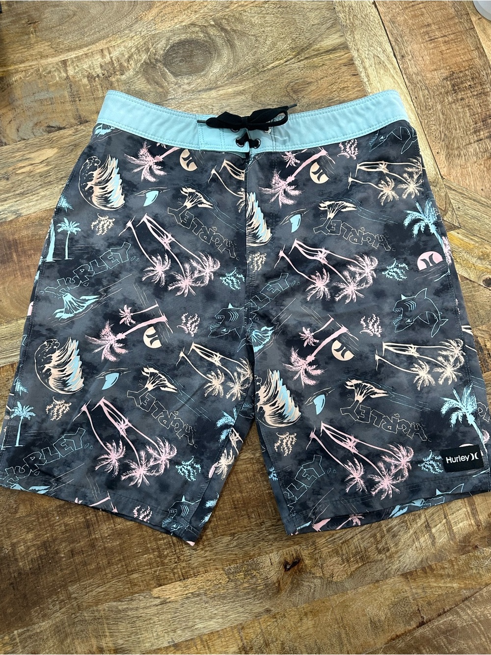 Hurley Black Swim Trunks with Blue Waistband and Pastel Tropical Print